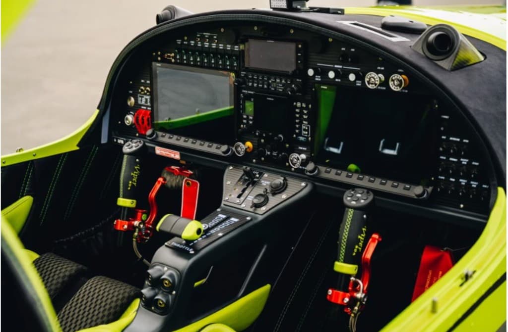 Viper SD4 glass cockpit with dual Garmin displays and lime green accents